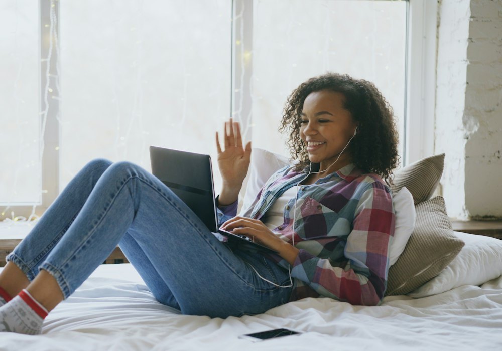 Woman reading health tips on her laptop